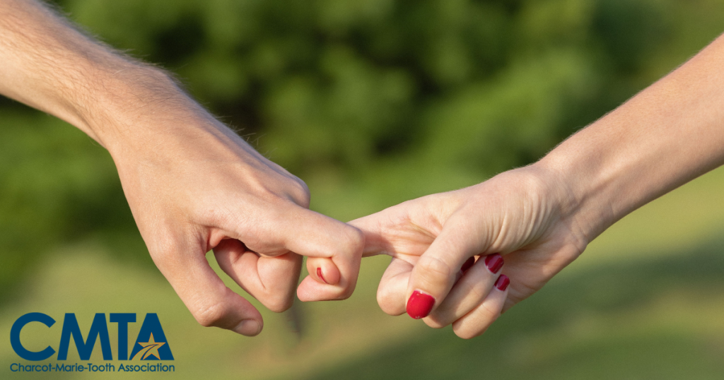 Two hands - holding fingers in support.
